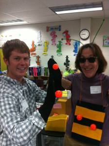 Connie and Eric test out equipment for the "pollinator game"  